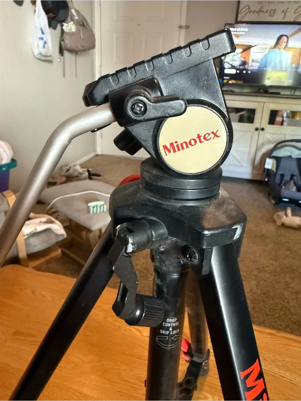 Black and Red Camera Tripod with Fluid Head